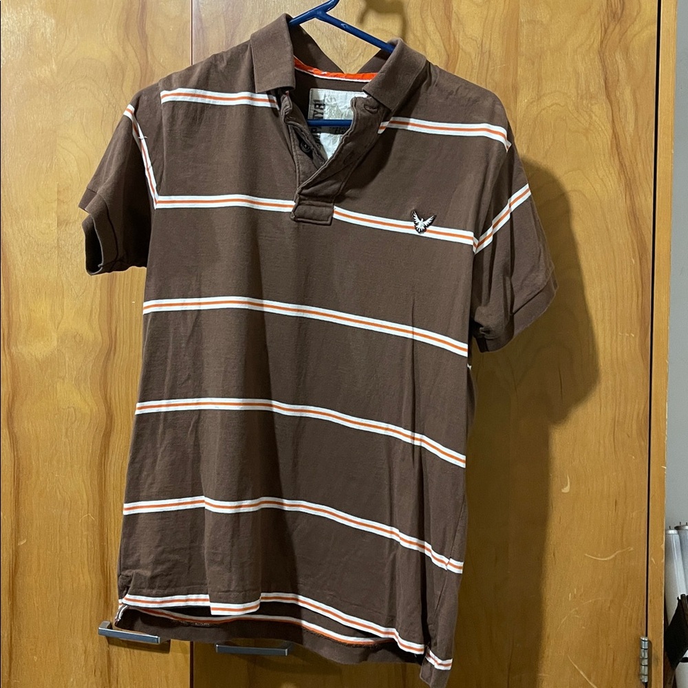 Classic Brown Polo with Orange and White Accents
